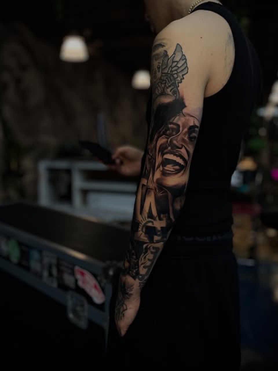 Black and grey realism sleeve by BlacMars at Yes Electric Tattoo Toronto