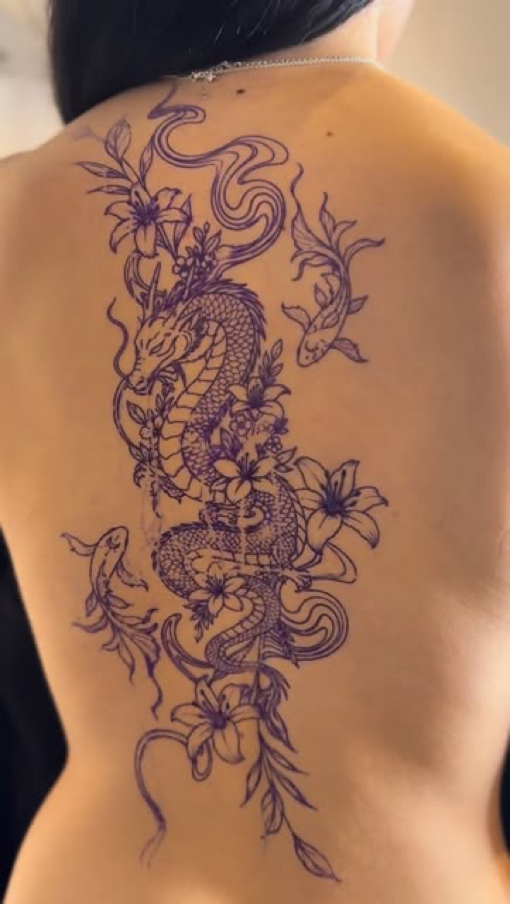 Fine line dragon spine tattoo by Lux at Yes Electric Tattoo Toronto