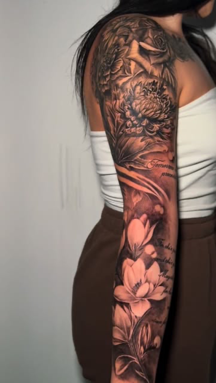 Fine line floral tattoo by Lux at Yes Electric Tattoo Queen West Toronto