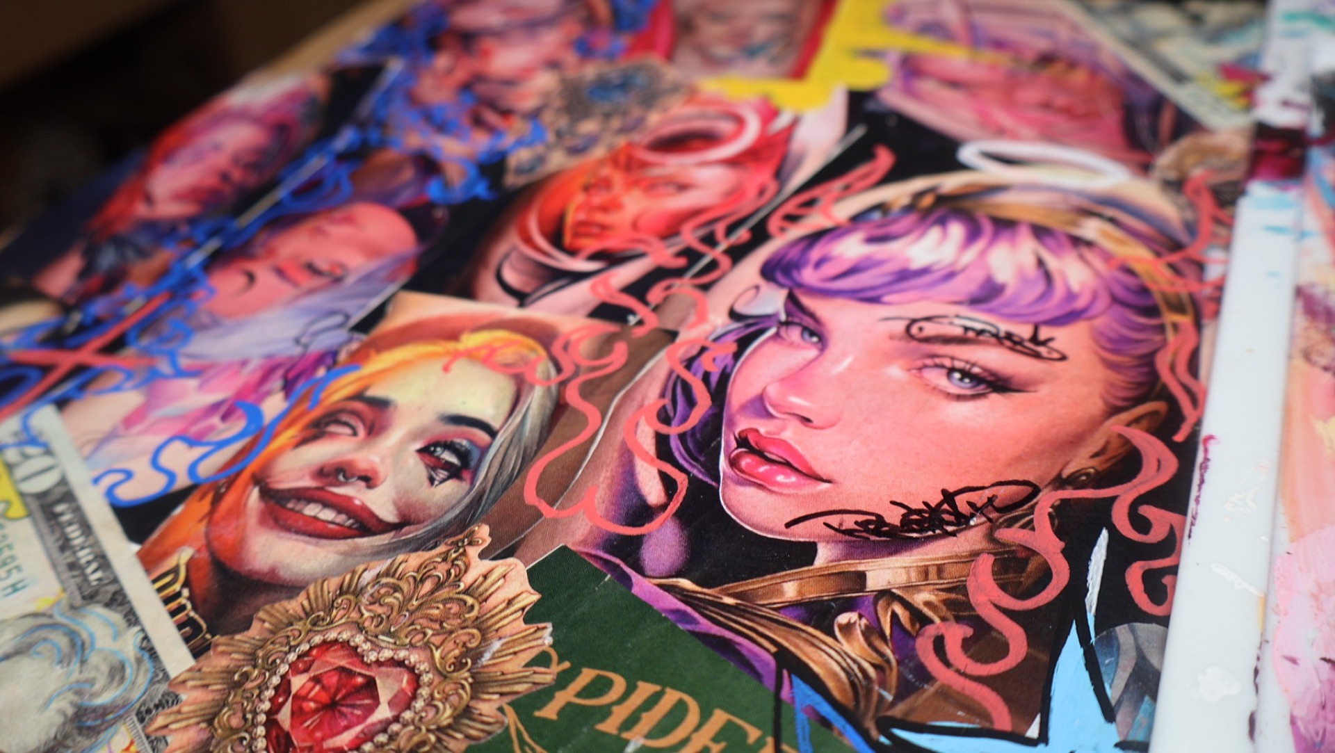 Colourful flash and graffiti art covering the walls at Yes Electric Tattoo Toronto